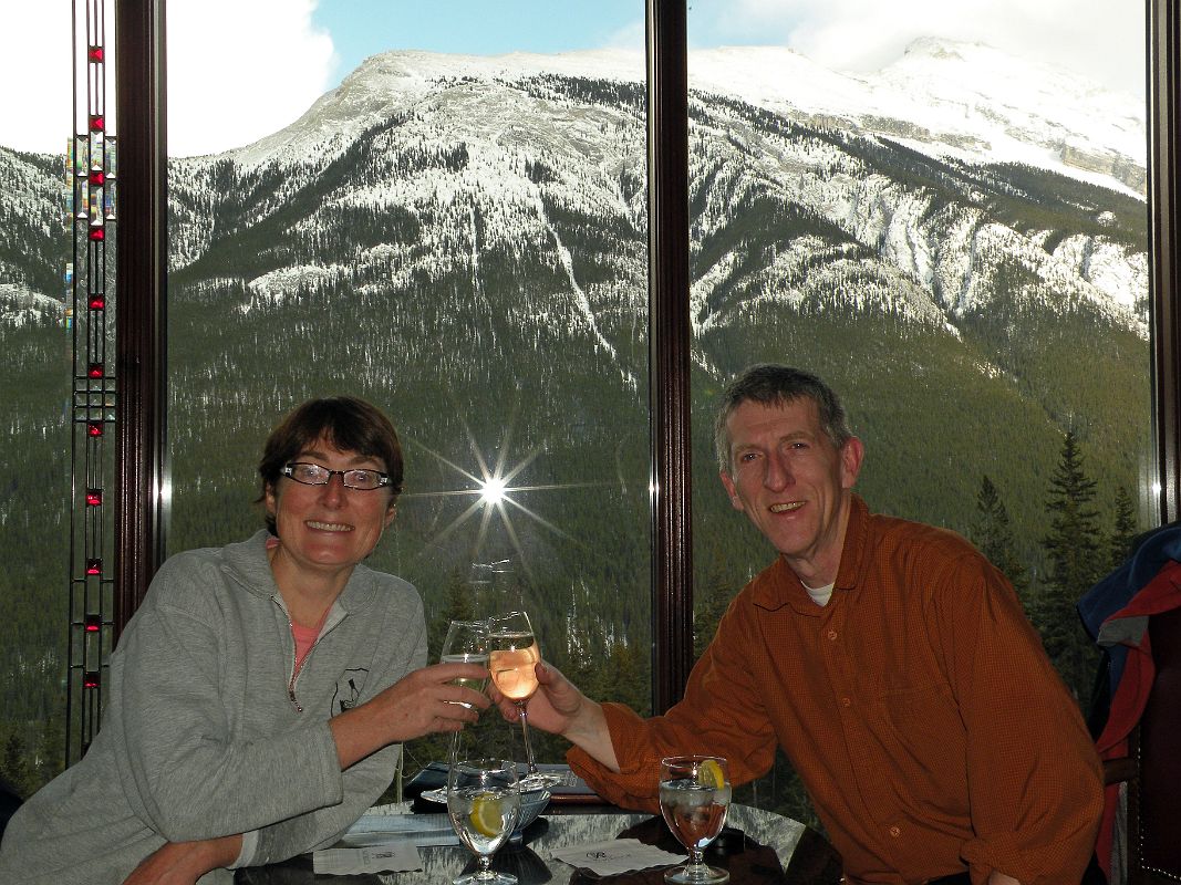 37 Charlotte Ryan And Jerome Ryan Enjoying An Apres Ski Drink At Rimrock Resort Hotel Overlooking Mount Rundle in Winter